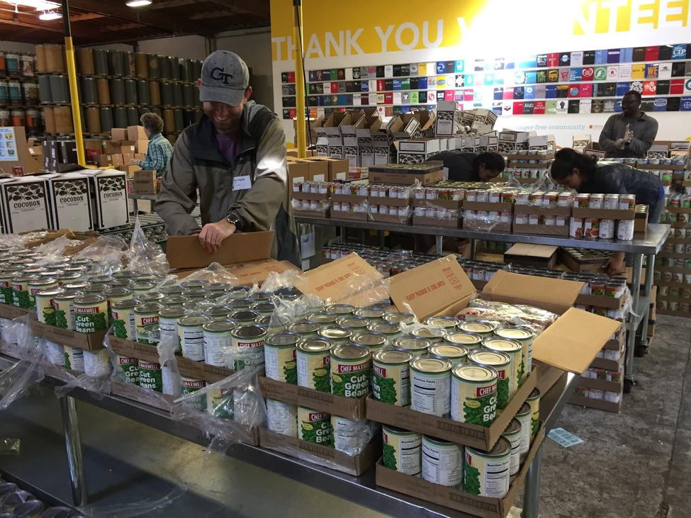 Packaging food boxes at Alameda Food Bank